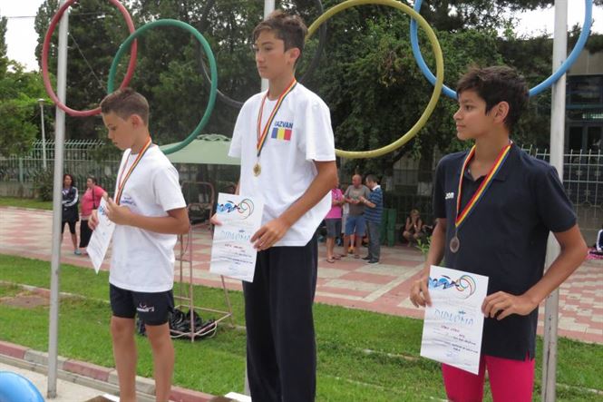 Podium 50 m bras băieți